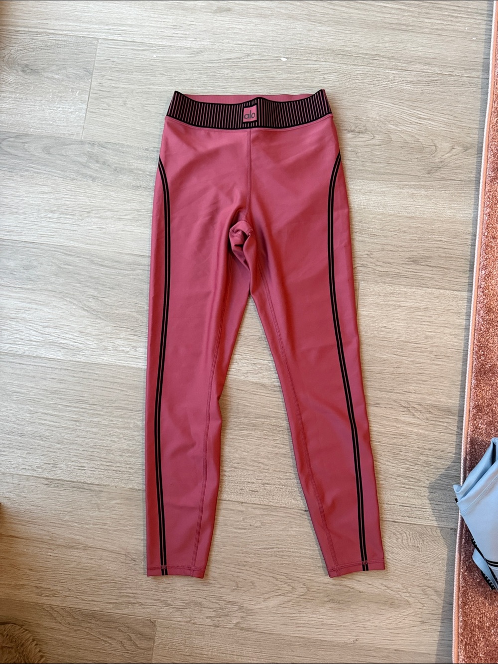 ALO Yoga Rose Pink Leggings with Black Side Stripes